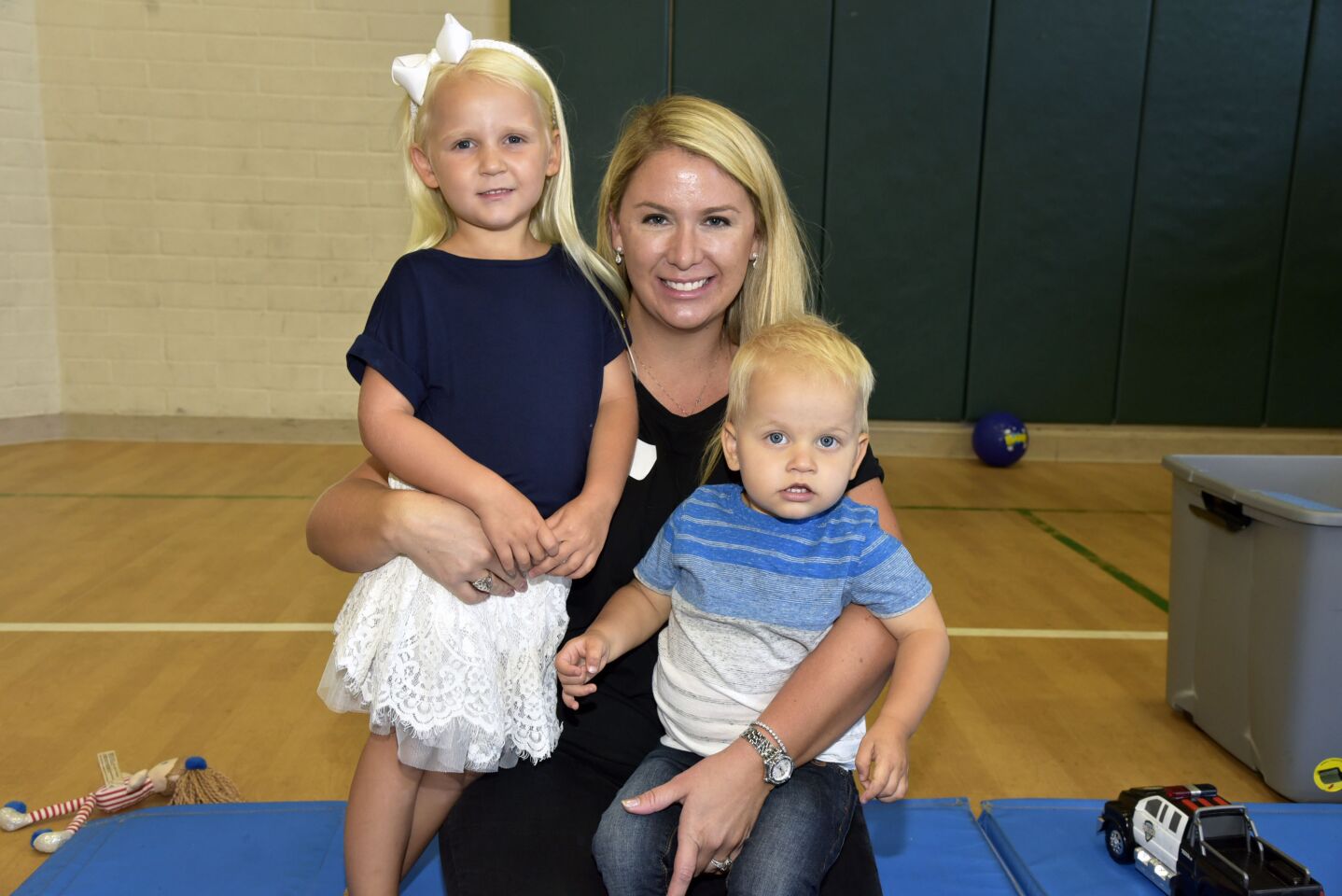 Moms and Tots co-chair Hailey Francis with Morgan and Blake