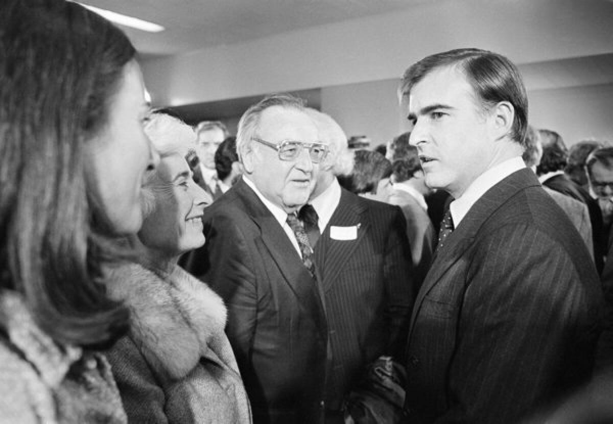 Gov. Jerry Brown, right, joins his parents, including former Gov. Pat Brown, after being sworn in to his second term as governor on Jan. 8, 1979. Jerry Brown has become the longest-serving California governor in history.