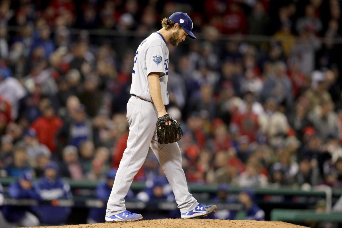 Clayton Kershaw #22 of the Los Angeles Dodgers reacts during the fifth inning against the Boston Red Sox in Game One of the 2018 World Series at Fenway Park on October 23, 2018 in Boston, Massachusetts.