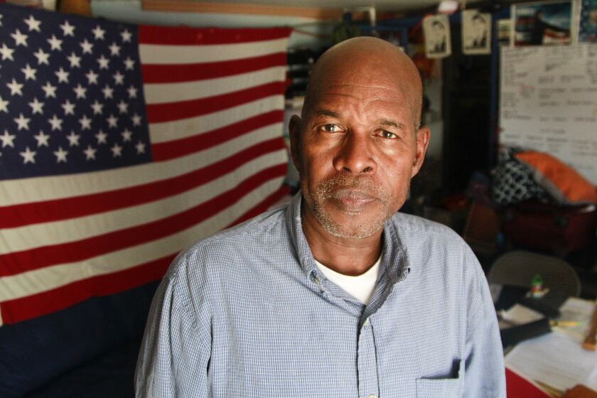 Roman Sabal, a US Marine veteran who was deported, poses for photos in Tijuana as he waits for his US citizenship interview on July 12, 2019 in Tijuana , Baja California. Sabal is at a facility called "The Bunker" in Tijuana, which is a deported veterans support house.
