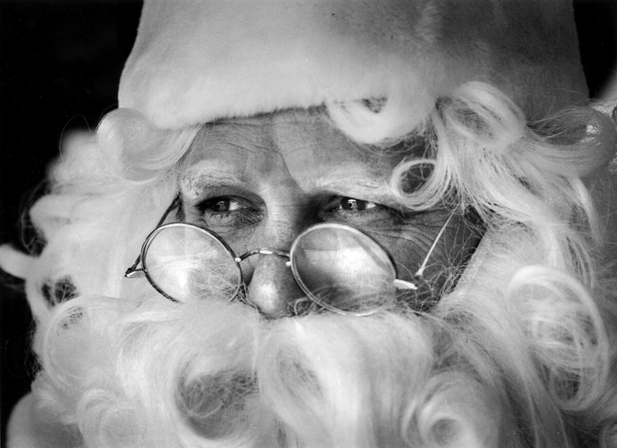 Dec. 20, 1990: Los Angeles Times reporter Bob Pool as the Kosher Santa on duty at Farmers Market.