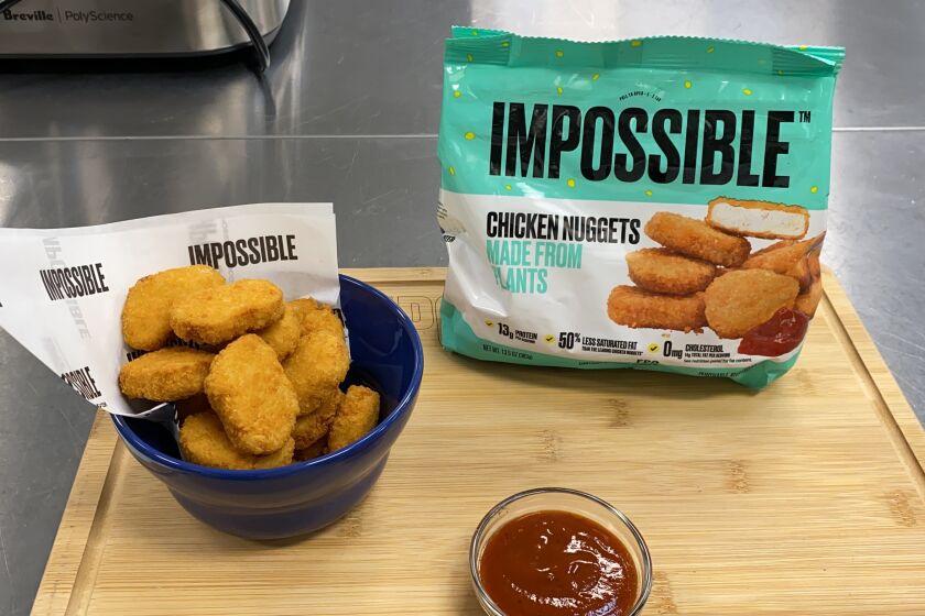 This Sept. 21, 2021 photo shows Impossible Foods’ new meatless nuggets in Redwood City, Calif. The nuggets are now available at some restaurants and will be sold in grocery stores nationwide later this year. (AP Photo/Terry Chea)