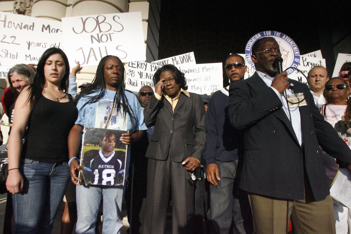 Family members of Kendrec McDade attend a rally in front of Pasadena City Hall in 2012. The NAACP organized the rally in response to the shooting of McDade by police.