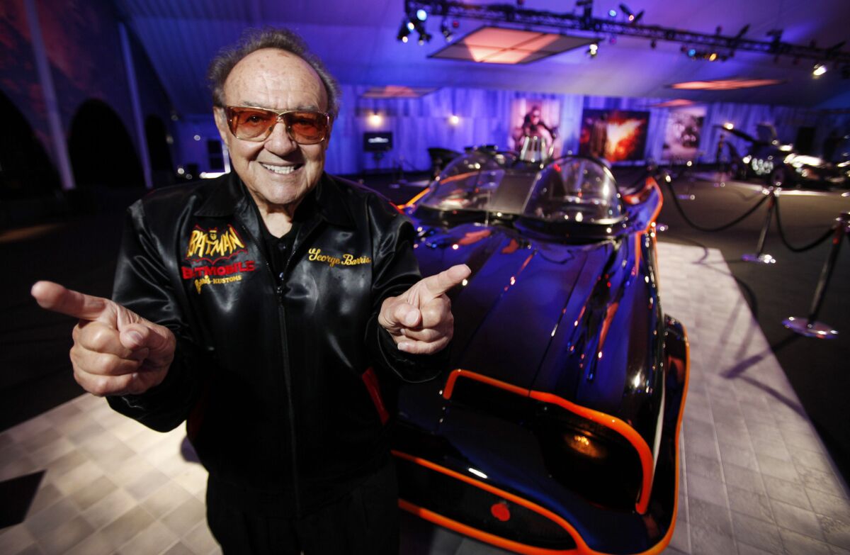 George Barris, the king of car customizers, stands by one of the original Batmobiles he created. It was on display at the 2012 Los Angeles Auto Show.
