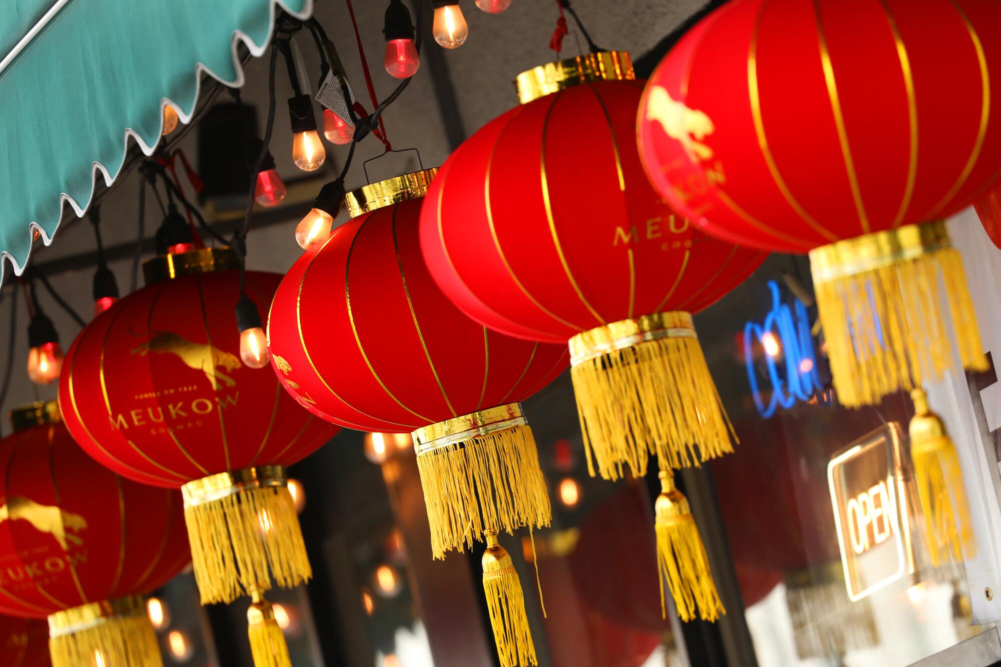 Lanterns hang across the entrance to King Com Tam restaurant.