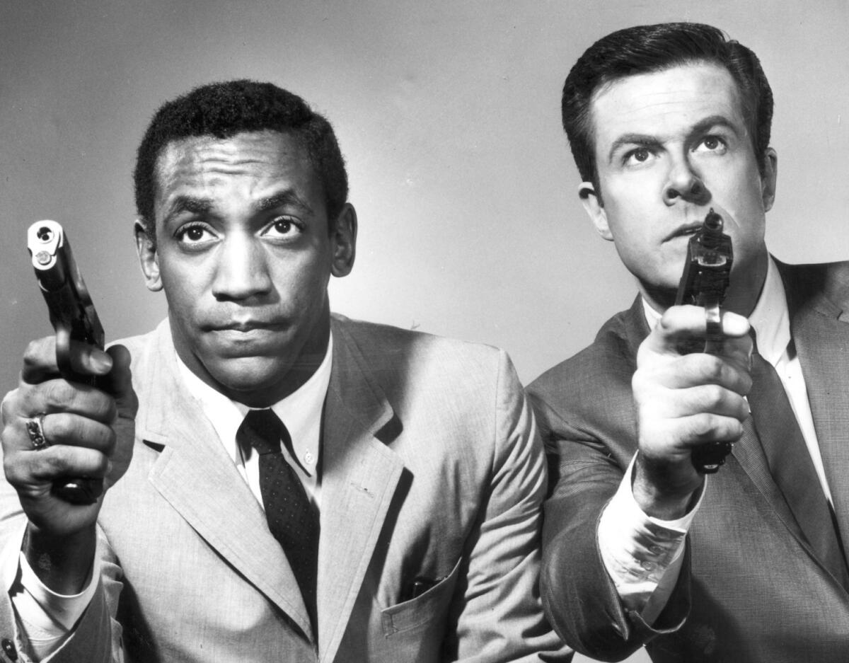 Bill Cosby, left, and Robert Culp made history on "I Spy," which featured a black man and a white man as equal partners. Cosby won an Emmy for his performance three years in a row.