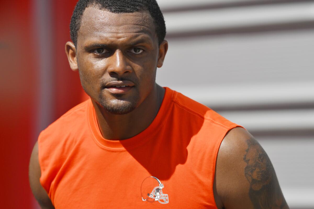Cleveland Browns quarterback Deshaun Watson walks off the field after the NFL football team's training camp, Wednesday, Aug. 3, 2022, in Berea, Ohio. The NFL is appealing a disciplinary officer’s decision to suspend Watson for six games for violating the league’s personal conduct policy. The move gives Commissioner Roger Goodell or someone he designates authority to impose a stiffer penalty. (AP Photo/David Richard)