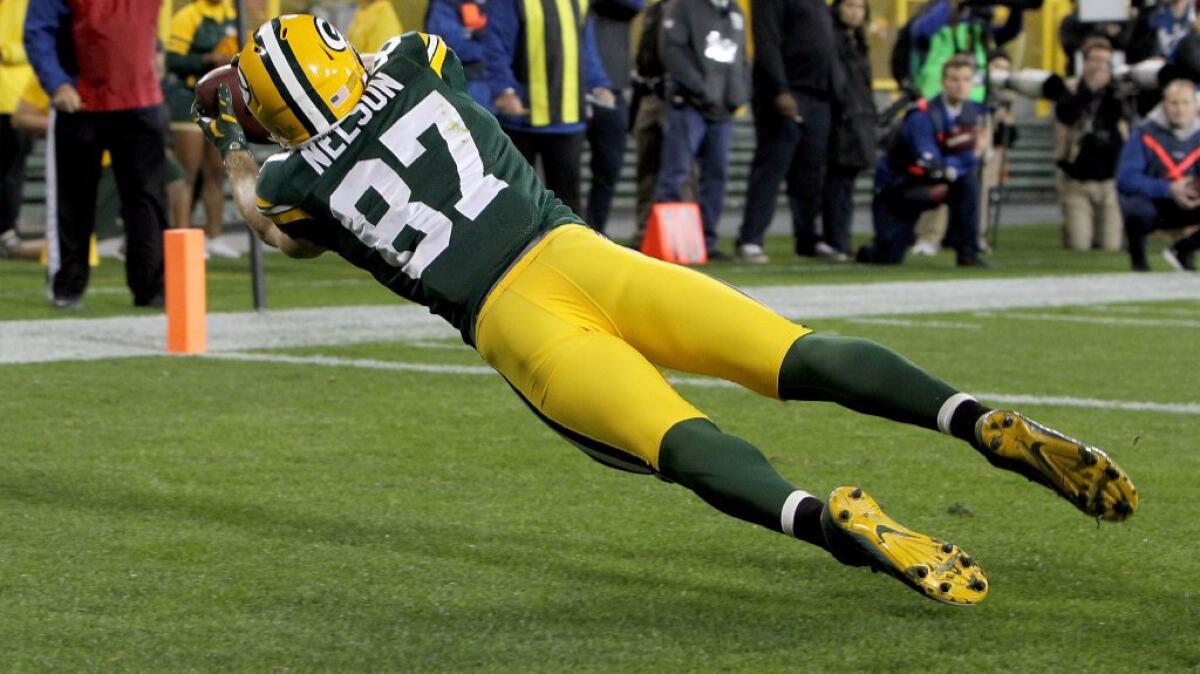 Packers receiver Jordy Nelson dives to make a touchdown catch against the Giants during a game on Oct. 9.