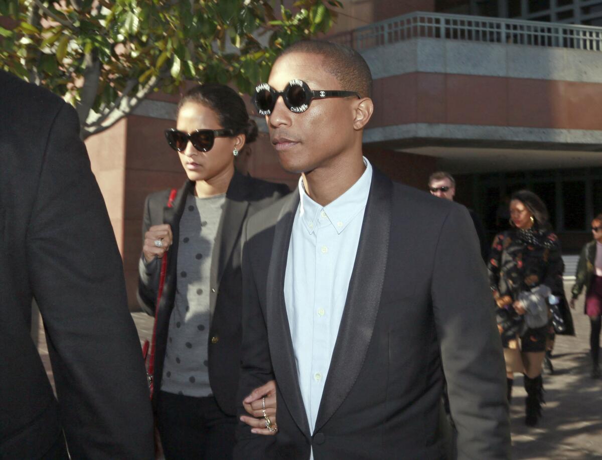 Pharrell Williams leaves the court building after testifying last Wednesday.