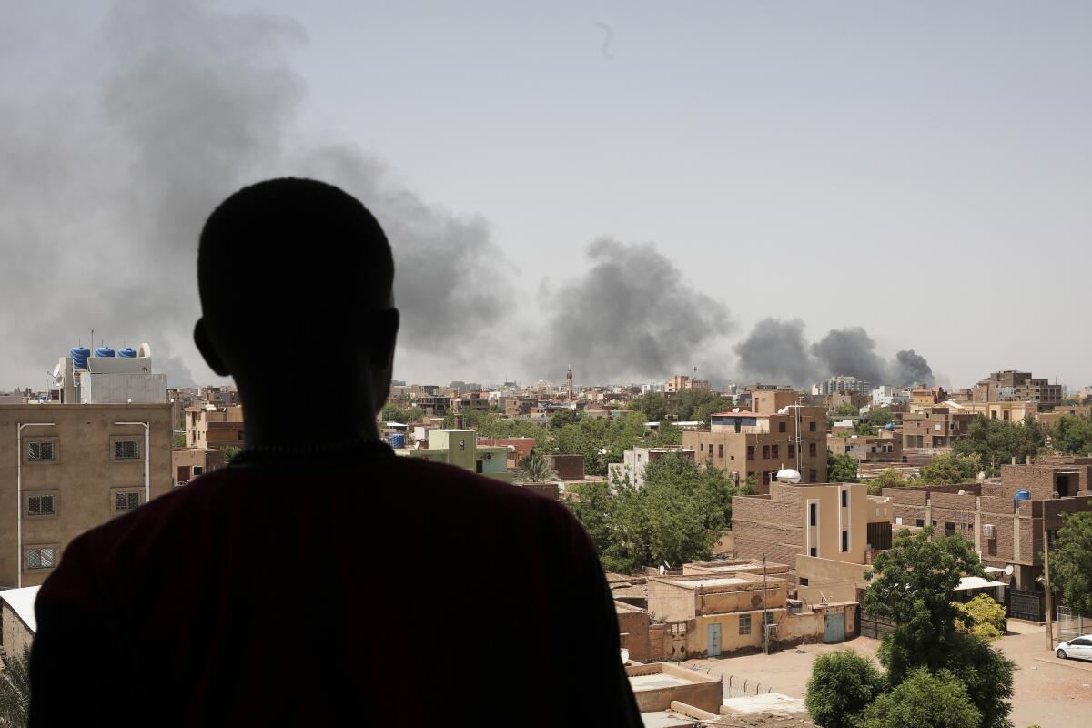 Smoke is seen in Khartoum, Sudan. 