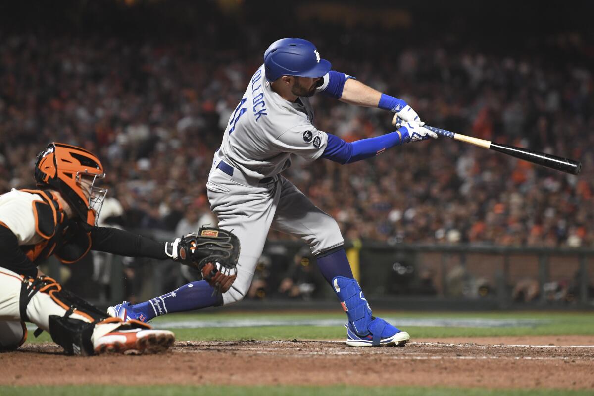 The Dodgers' AJ Pollock connects for a double.