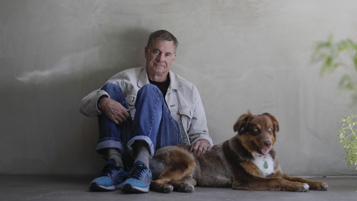 Director Gus Van Sant at home with his Australian shepherd, Leo. Van Sant's new film, "Don't Worry, He Won't Get Far on Foot," deals with alcoholism, addiction and a strange, tragic path toward recovery.