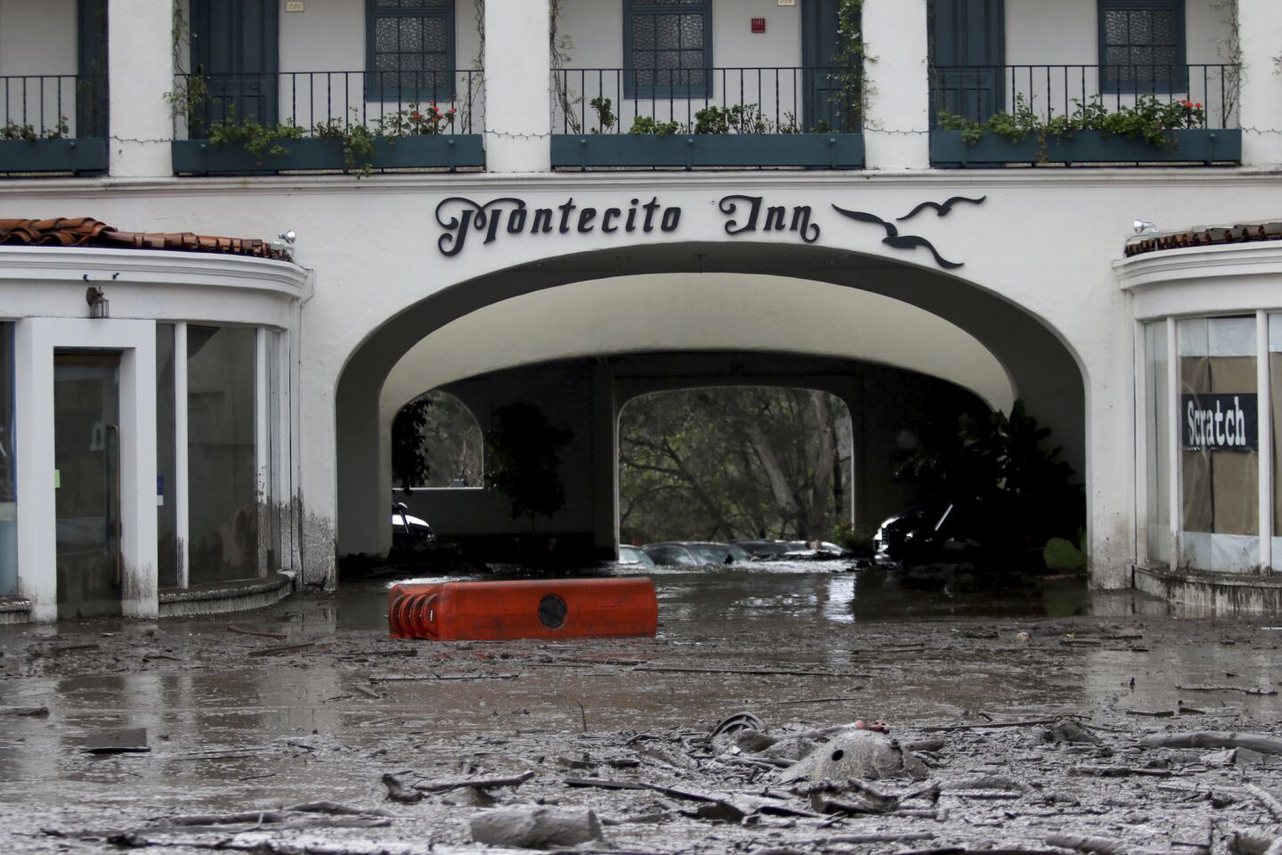 Debris and mud cover the entrance of the Montecito Inn after heavy rain brought flash flooding and mudslides to the area.