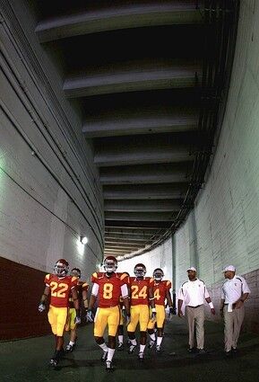 USC Trojans walk out to the field at the Los Angeles Memorial Coliseum.