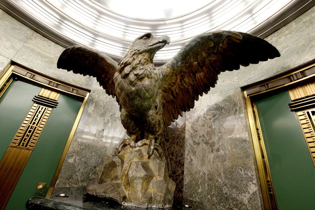 The Globe Lobby contained The Times' iconic eagle and walls made of green suede marble.