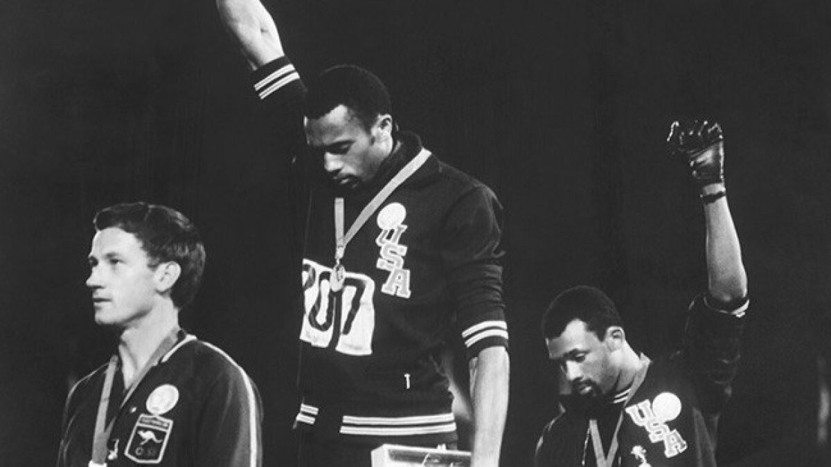 Tommie Smith and John Carlos protest with the Black Power salute at the Summer Olympic Games in Mexico City in 1968. 