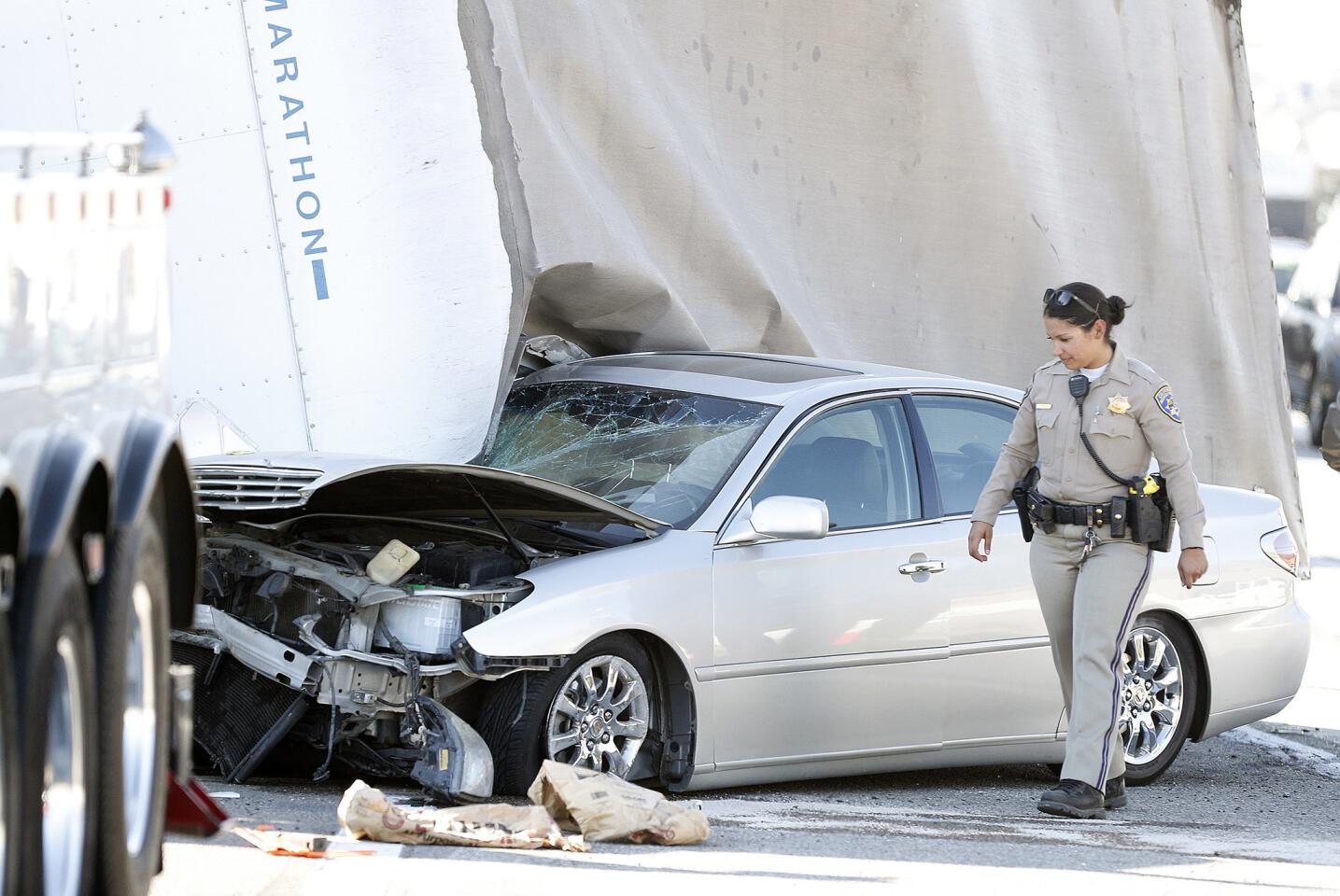 Photo Gallery: Box truck and car tangle at southbound Interstate 5 exit at Burbank Boulevard