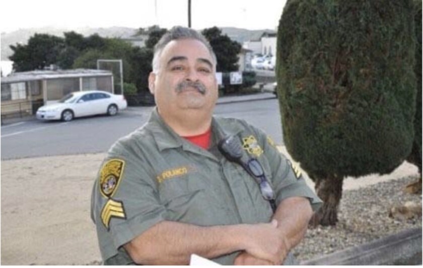 San Quentin guard Sgt. Gilbert Polanco in uniform in a family photo