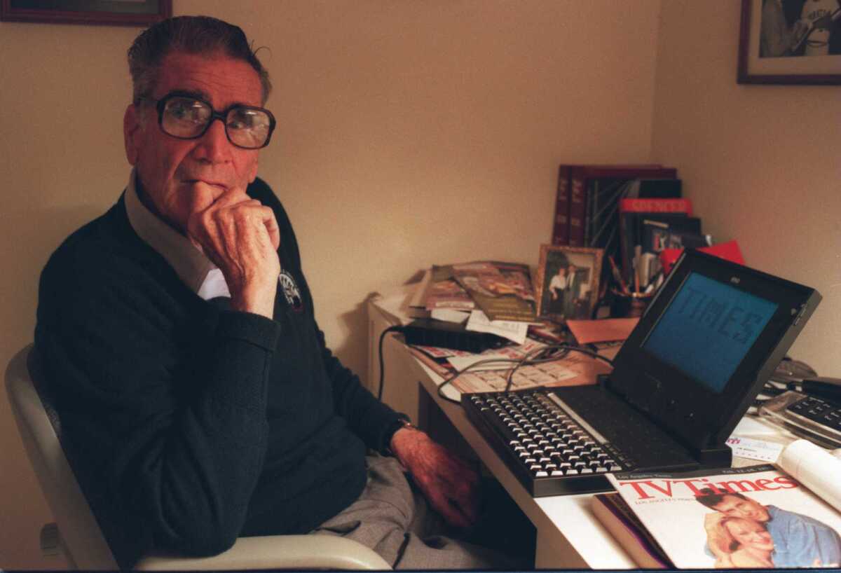 Jim Murray at his desk in February 1995.