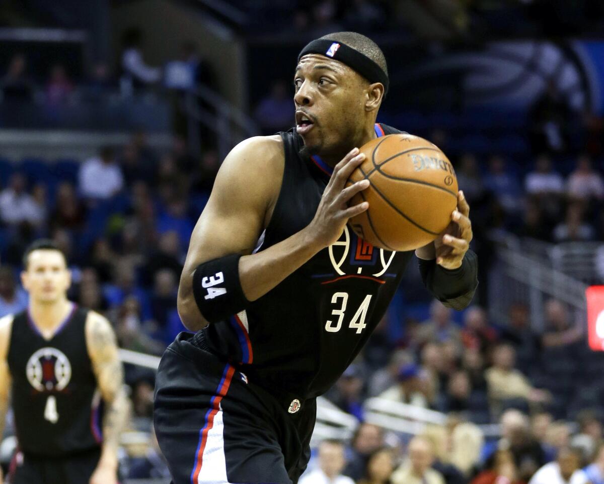 Clippers forward Paul Pierce looks for an open shot against the Magic during the first half of a game on Feb. 5.