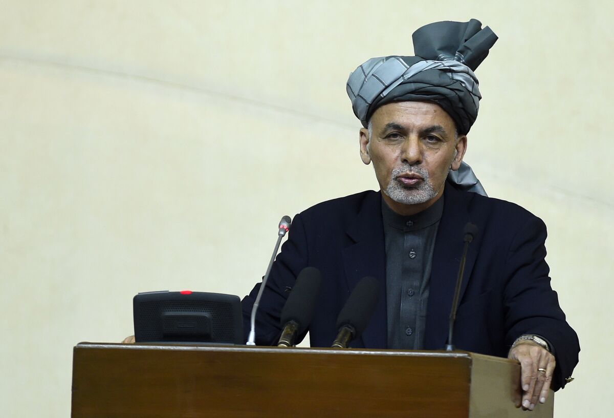Afghan President Ashraf Ghani speaks to the nation's parliament in Kabul on Monday.