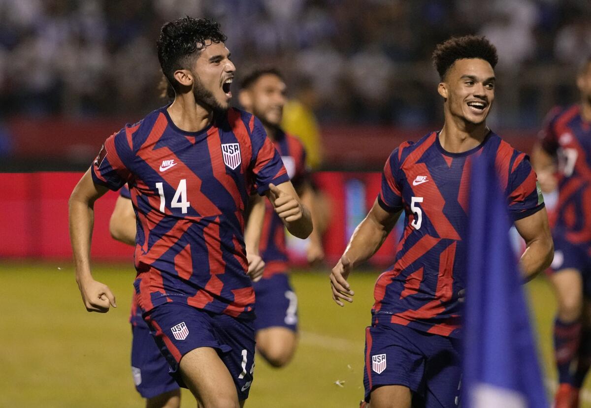 Ricardo Pepi, No. 14, celebrates after scoring for the U.S. against Honduras.