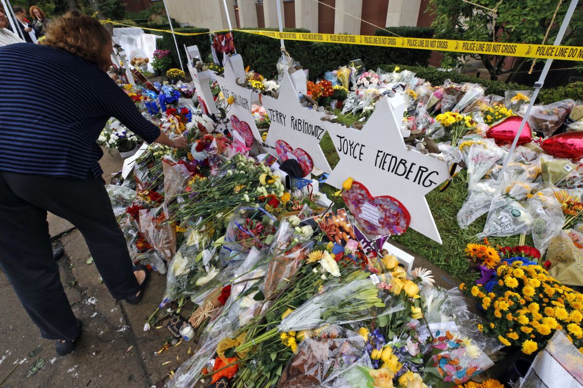 Flowers are placed Nov. 1, 2018, at a memorial outside the Tree of Life Synagogue in Pittsburgh.