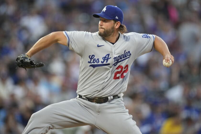 Dodgers starting pitcher Clayton Kershaw works against the Colorado Rockies in the sixth inning on June 27, 2023, in Denver.
