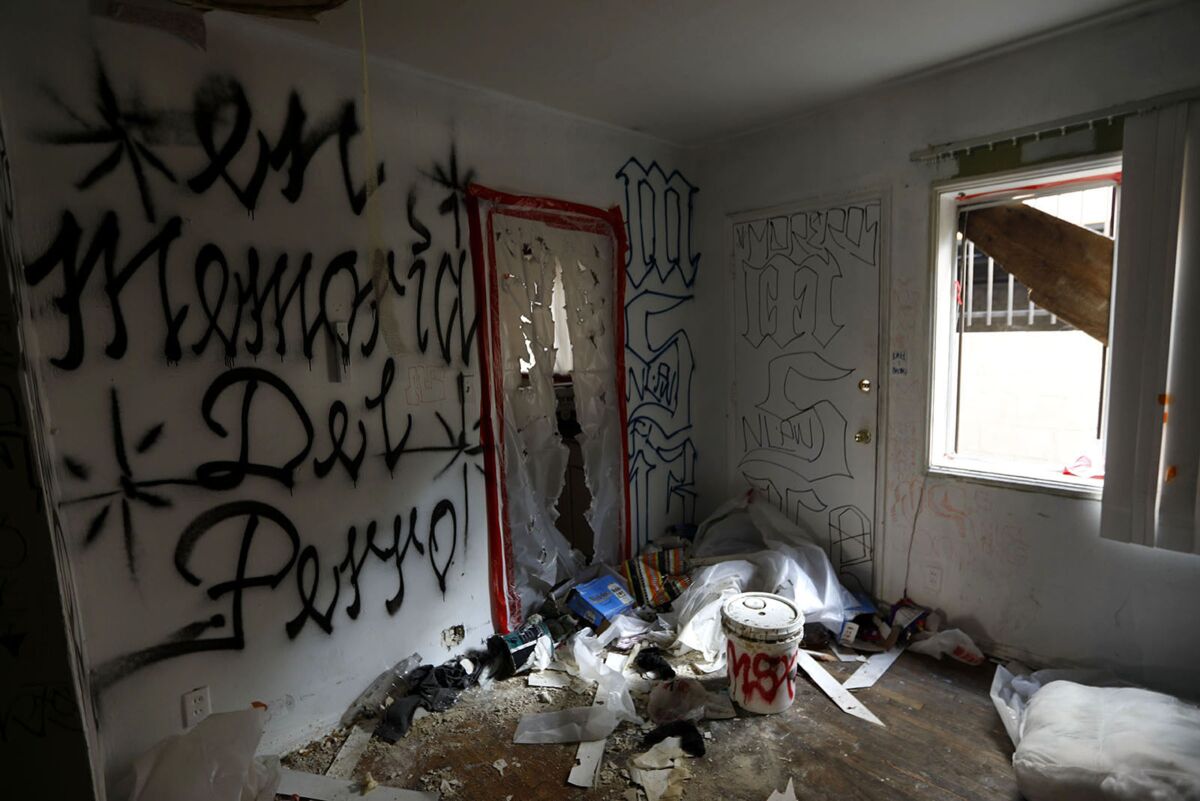 Debris and graffiti inside an abandoned building