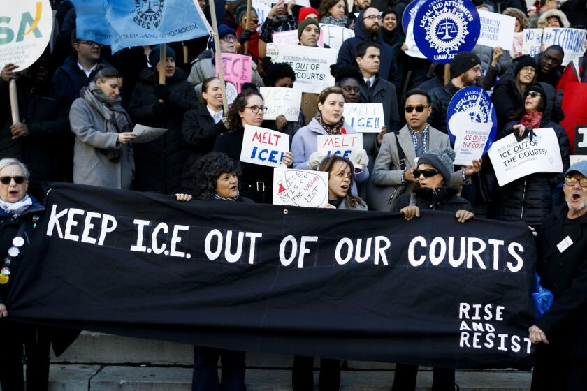 Mandatory Credit: Photo by JUSTIN LANE/EPA-EFE/REX/Shutterstock (9264319b) A group of people from various organizations including public defense attorneys, local unions, and other legal and community groups gather to protest current Immigration and Customs Enforcement (ICE) tactics at courthouses and courtrooms in Brooklyn, New York, USA, 07 December 2017. ICE agents have been arresting and detaining people suspected of breaking immigration laws while they are appearing at courthouses for unrelated reasons, a practice that many attorneys and legal experts are arguing against as it deters people who are either undocumented or have questionable immigration status from appearing in court. Rally Against ICE Immigration Arrests in Courthouses, New York, USA - 07 Dec 2017 ** Usable by LA, CT and MoD ONLY **
