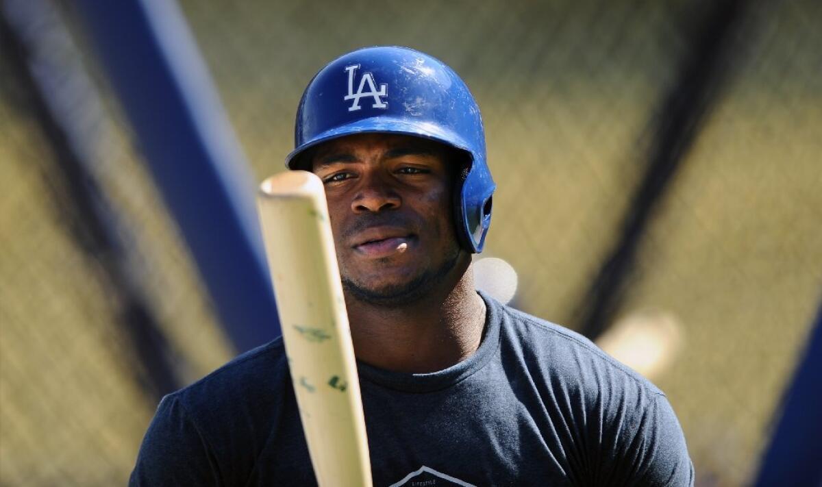 Talking to Yasiel Puig weighs on the mind of Dodgers Manager Dave Roberts -  Los Angeles Times