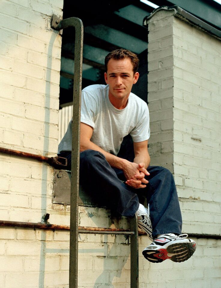 Luke Perry poses during an interview in New York in 2001.