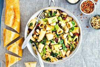 Rigatoni with Escarole, Cannelli Beans, Sun-Dried Tomatoes and Walnuts.