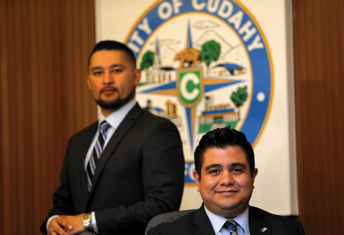 “Technology is playing a critical role not just for us millennials but Latinos in general,” said Cudahy Vice Mayor Christian Hernandez, 26, left. With him is Mayor Cristian Markovich, 29.