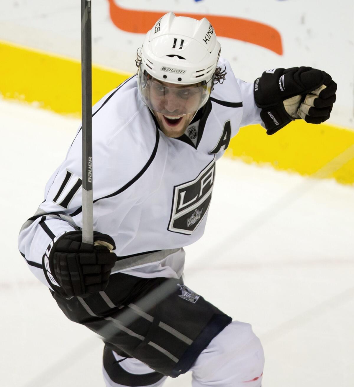 Center Anze Kopitar celebrates his winning goal during the Kings' 3-2 overtime victory over the Vancouver Canucks on Monday night.