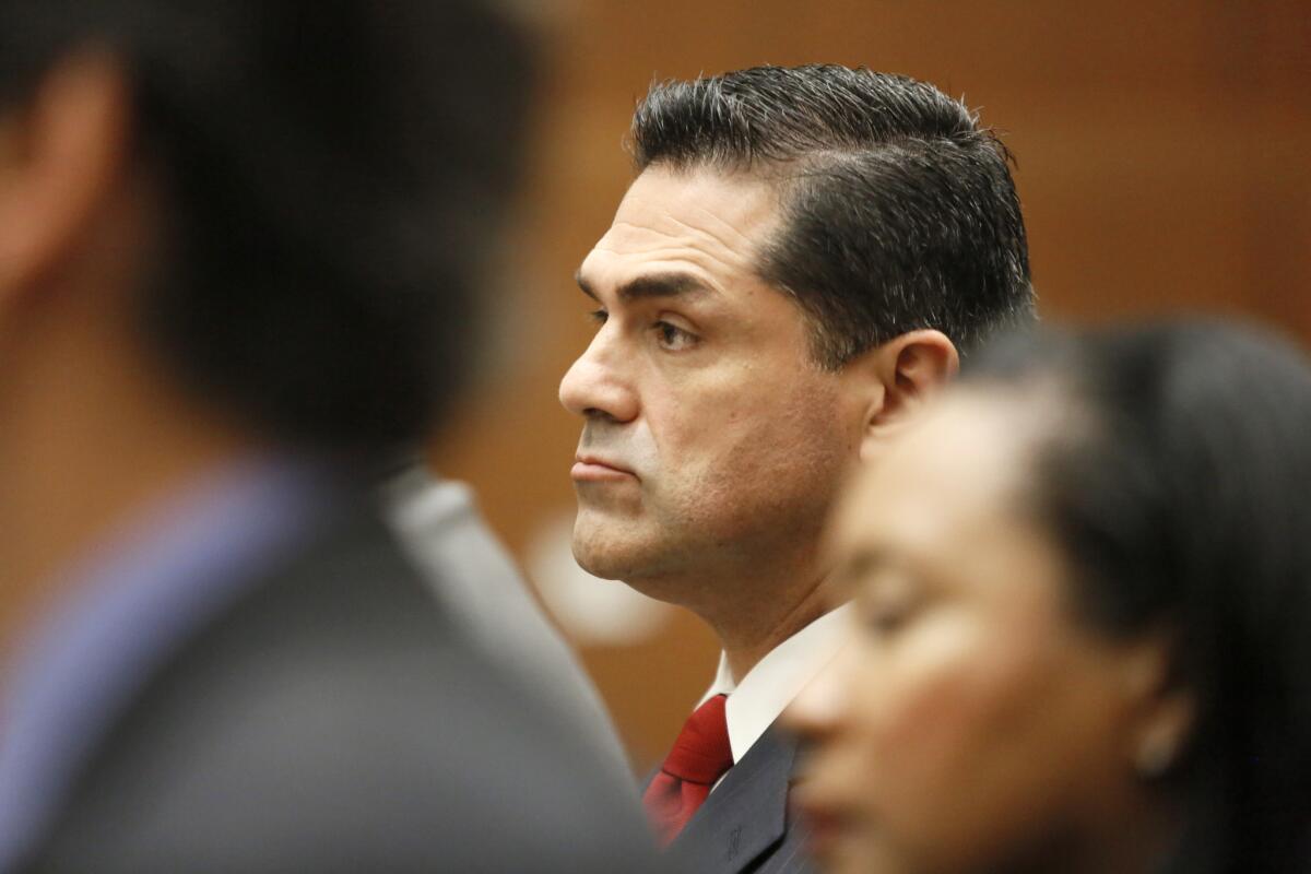 Former L.A. County Assessor John Noguez appears in a downtown Los Angeles courtroom in 2013.