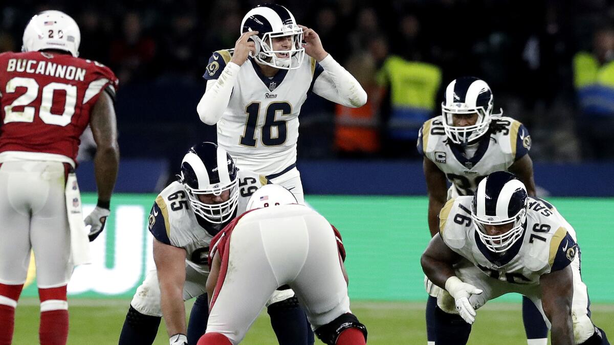 Rams quarterback Jared Goff (16) calls an audible against the Arizona Cardinals on Oct. 22 at London.