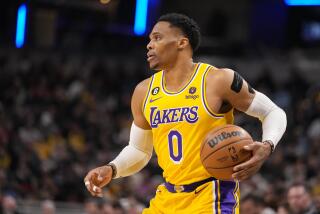Los Angeles Lakers guard Russell Westbrook (0) plays against the Indiana Pacers.