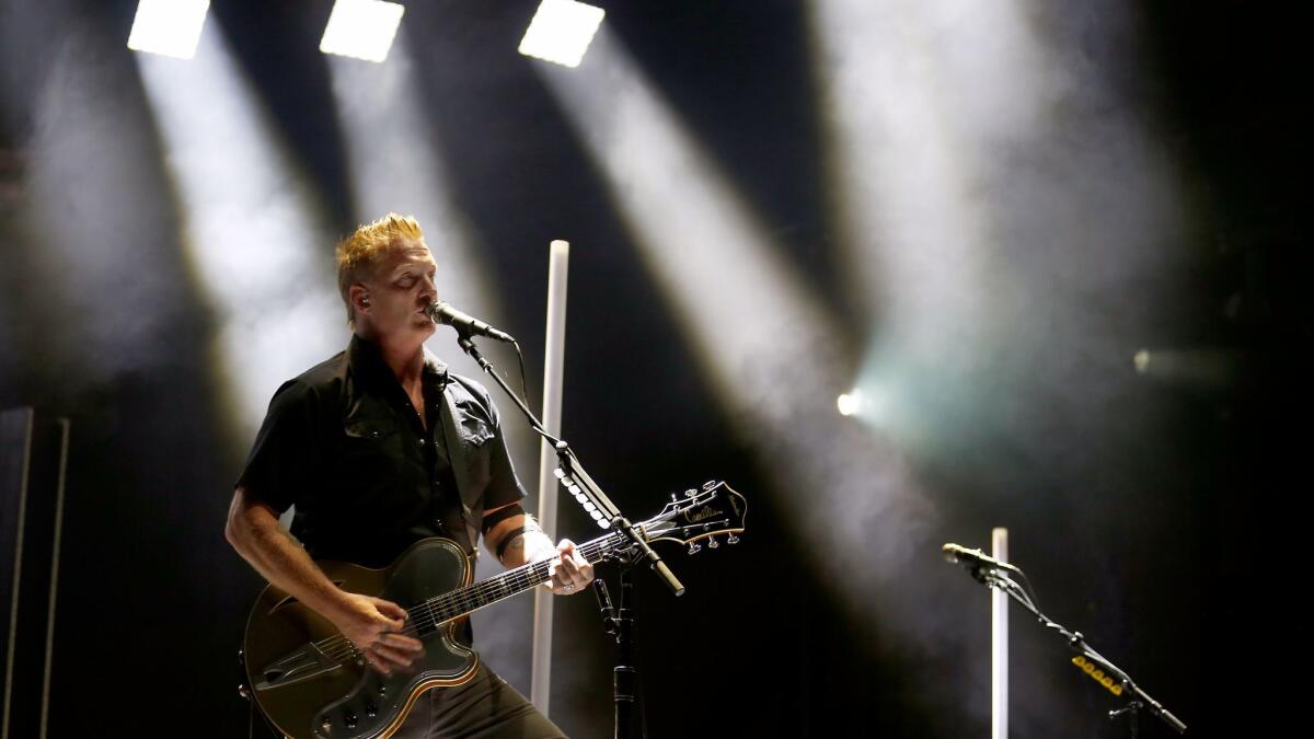 Queens of the Stone Age's Josh Homme onstage at Cal Jam. "We are nothing when we're apart, and we're everything when we're together," he told the crowd.