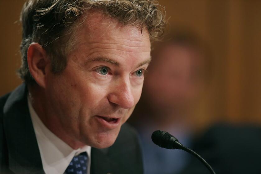 Sen. Rand Paul (R-Ky.)met with NAACP members Friday in Ferguson, Mo., which has been roiled by unrest since a white police officer killed an unarmed black man in August.