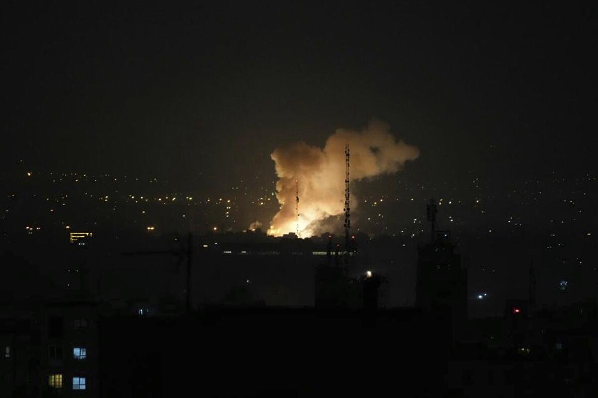 Smoke rises after an explosion in Tehran.