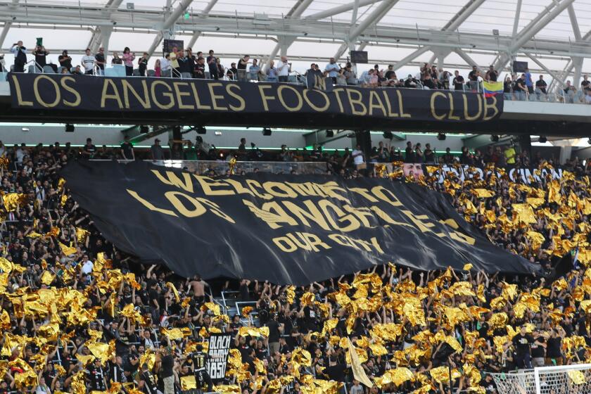 Los Angeles Football Club fans rally before a game with the L.A. Galaxy at the Banc of California Stadium in Los Angeles.