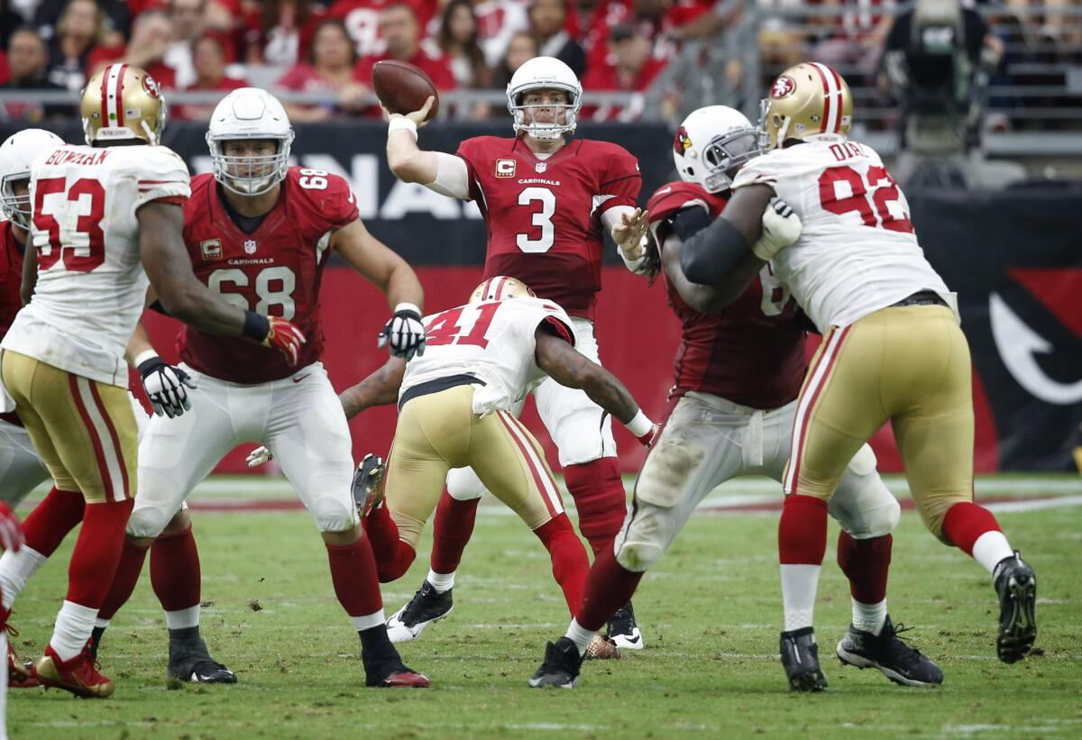 Cardinals quarterback Carson Palmer (3) throws from the pocket against the 49ers during the second half of a game this weekend.