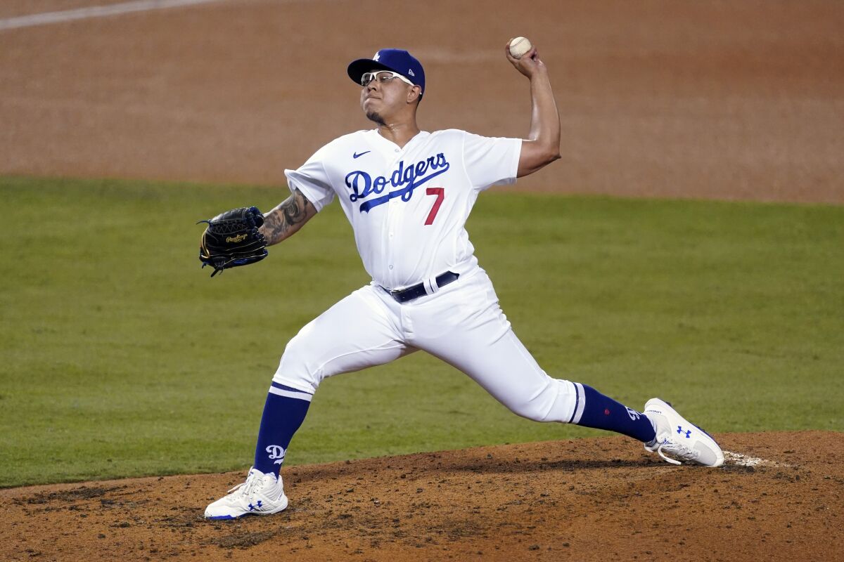 Los Angeles Dodgers relief pitcher Julio Urias throws to the Milwaukee Brewers during Game 1.