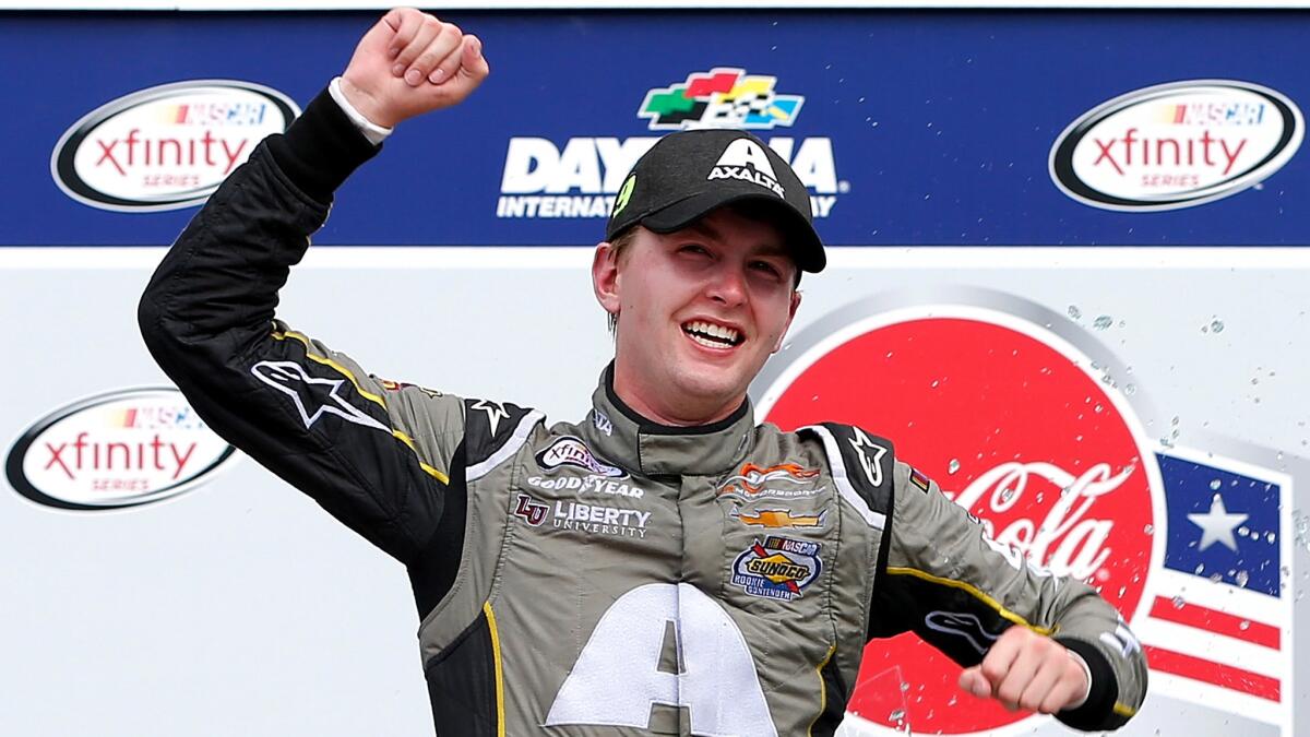 NASCAR driver William Byron celebrates after winning the Xfinity Series Coca-Cola Firecracker 250 at Daytona International Speedway on Saturday.