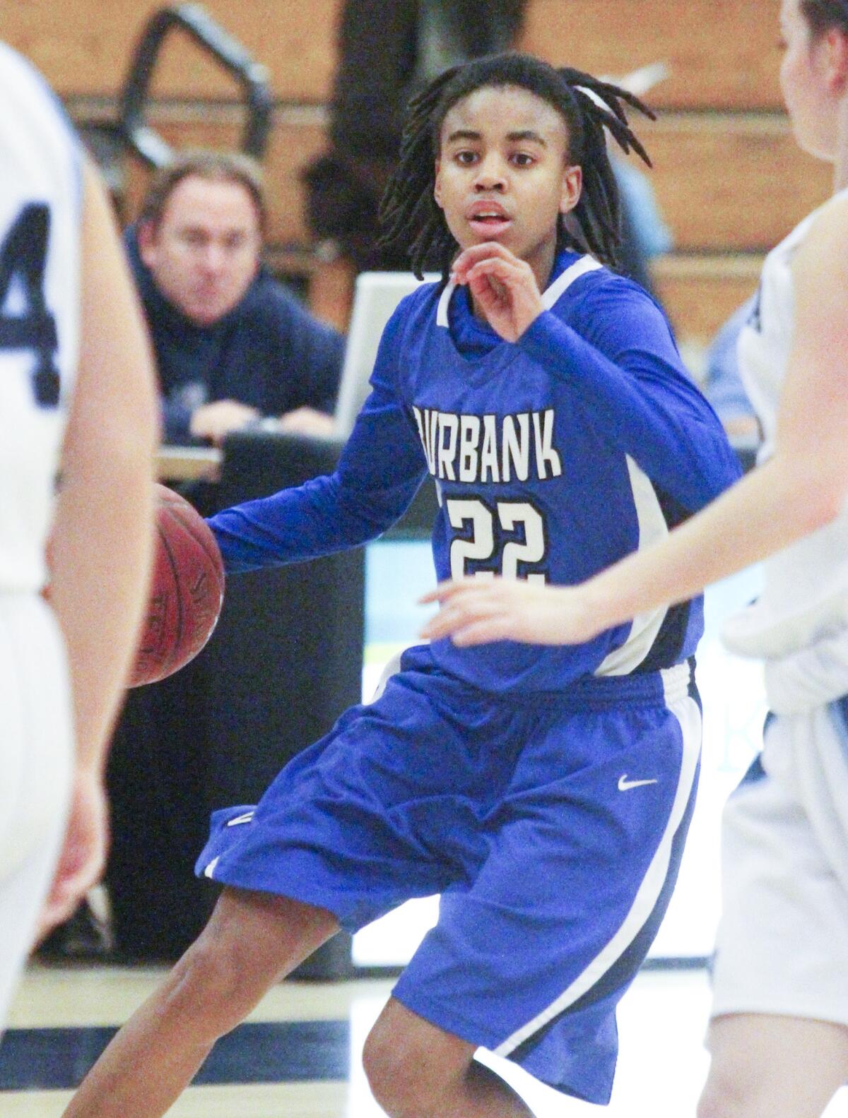 Burbank's Yassemeen Sa'Dullah dribbles upcourt against Crescenta Valley in a Pacific League girls basketball game at Crescenta Valley High School on Wednesday, February 5, 2014.