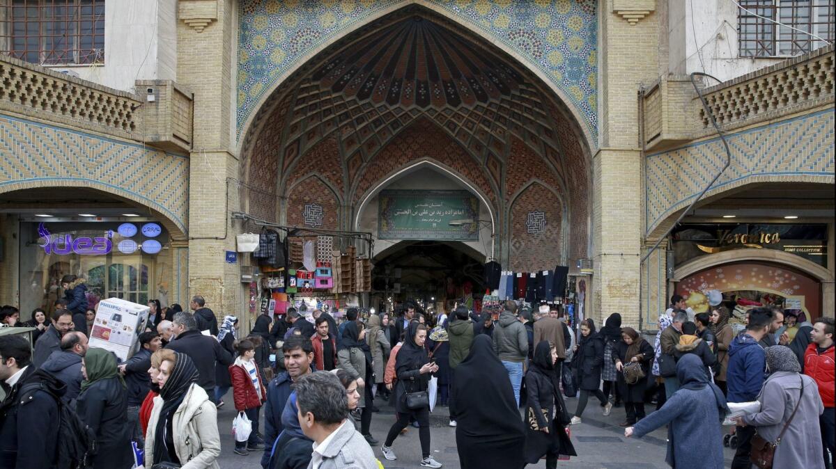People walk around the Grand Bazaar in Tehran, Iran, on Feb. 7.