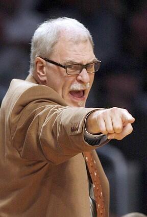 Lakers coach Phil Jackson yells out to his players during Sunday's game.