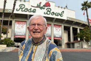 Reynolds Crutchfield, 93, stands in front of the Rose Bowl in December 2023.