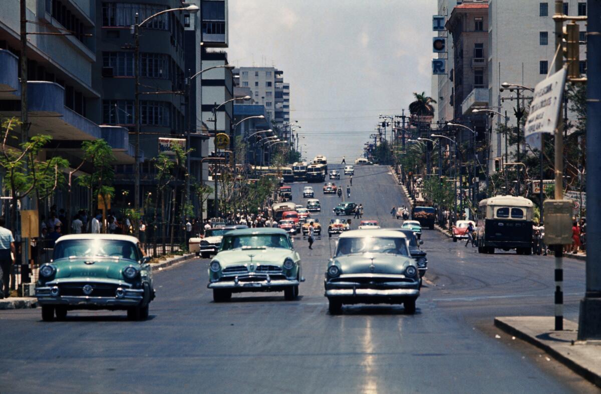 Avenida 23 (also known as La Rampa) in Havana circa 1959 and on April 18, 2015.